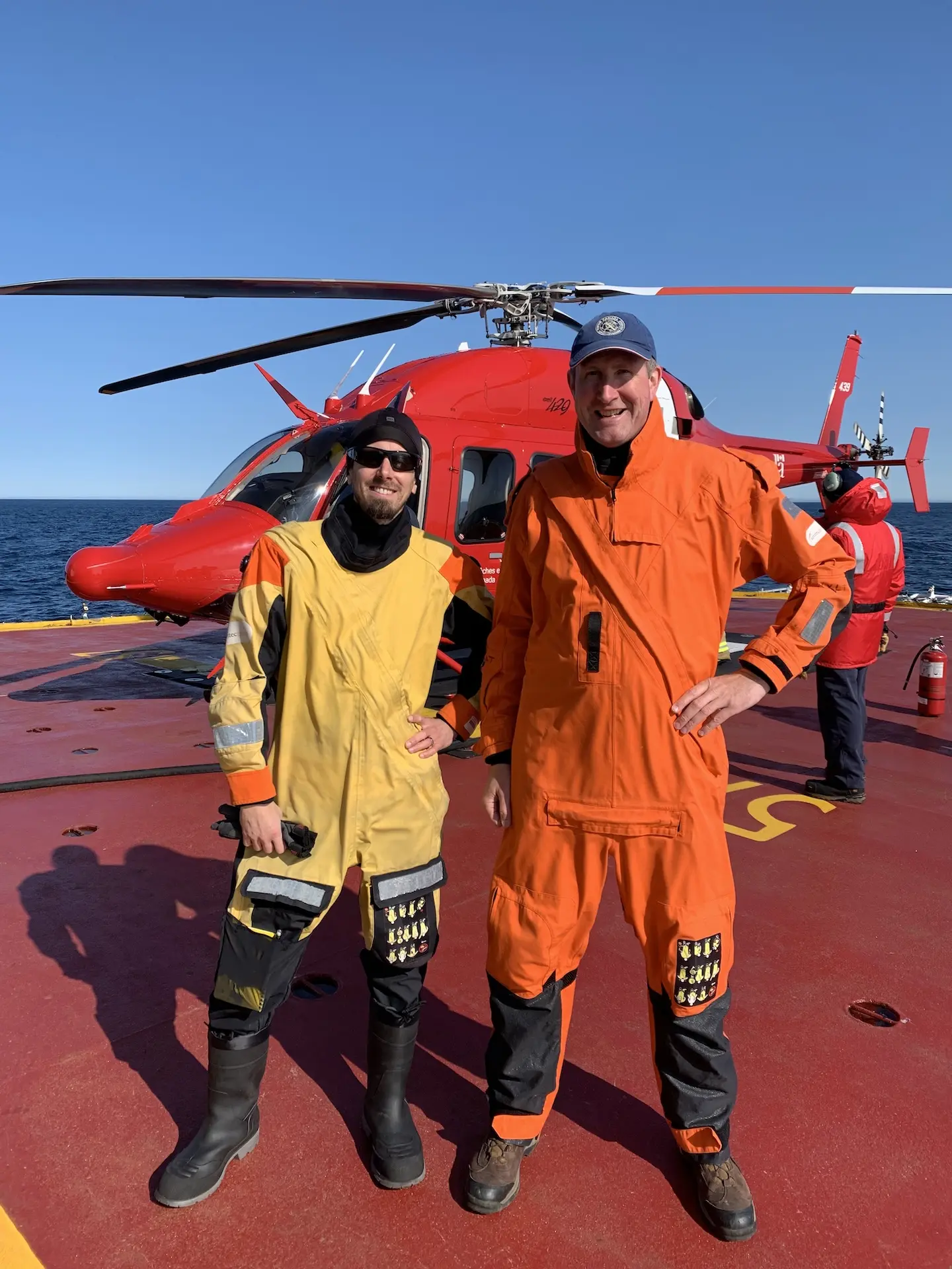 Adam Garbo and Luke Copland preparing for helicopter-based ITB deployments
