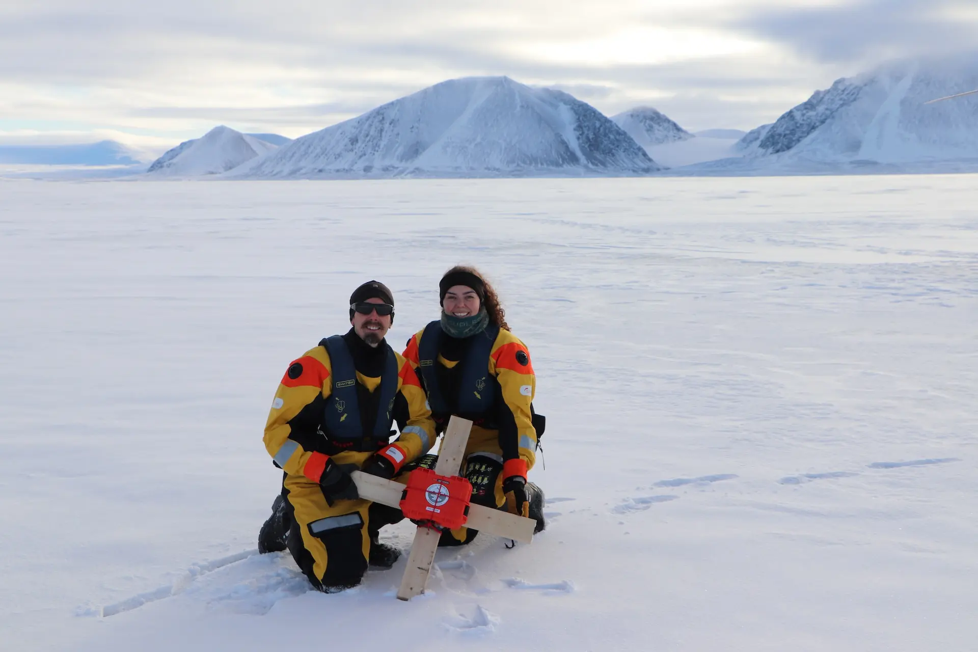 Adam Garbo and Erika Brummell deploying a Cryologger ITB from the Amundsen
helicopter onto a drifting ice island